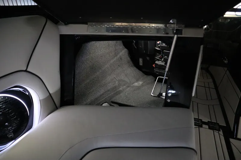 Slide: The Image of Luxurious interior of 2024 Centurion Ri230 boat with illuminated seating and speakers. - 98