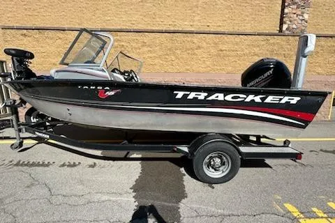 The Image of 2012 Tracker Targa V-18 WT boat on trailer, side view, outdoors. - 0