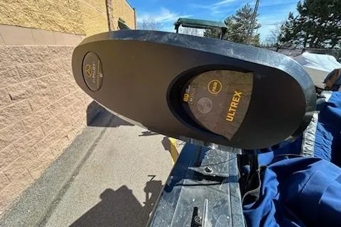 Slide: The Image of 2012 Tracker Targa V-18 WT boat with Ultrex trolling motor in outdoor setting. - 12