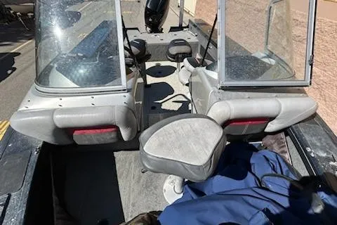 Slide: The Image of 2012 Tracker Targa V-18 WT boat interior with seating and windshield. - 15