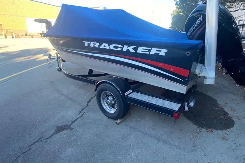 Slide: The Image of 2012 Tracker Targa V-18 WT boat on trailer with blue cover. - 3