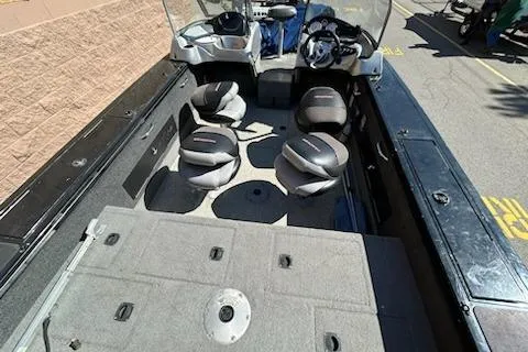 Slide: The Image of 2012 Tracker Targa V-18 WT boat interior with seating and steering console. - 6
