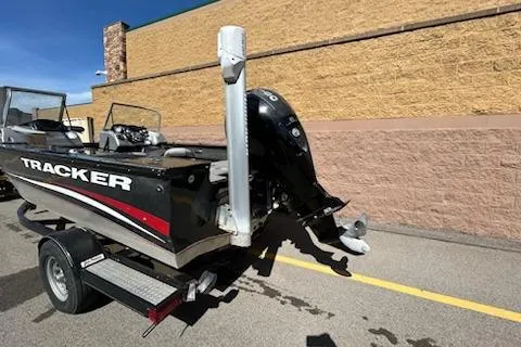 Slide: The Image of 2012 Tracker Targa V-18 WT boat on trailer, parked outdoors. - 8