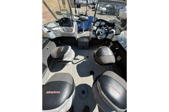 Slide: The Image of 2012 Tracker Targa V-18 WT boat interior with seating and dashboard view. - 9