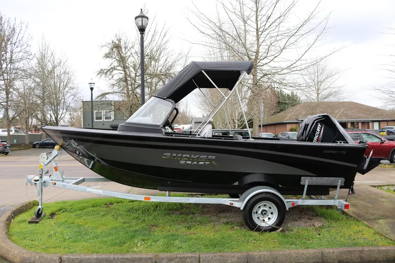 The Image of 2026 Smoker Craft Osprey 172 boat on trailer, parked outdoors. - 1