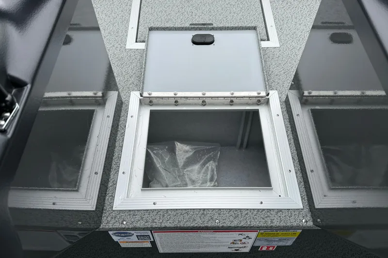 Slide: The Image of 2026 Smoker Craft Osprey 172 boat storage compartment with open hatch. - 20