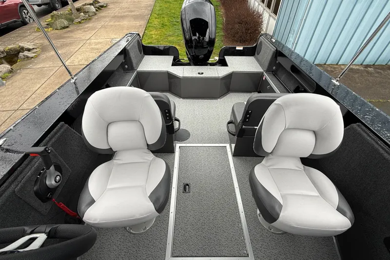 Slide: The Image of Interior of 2026 Smoker Craft Osprey 172 boat with two cushioned seats. - 21