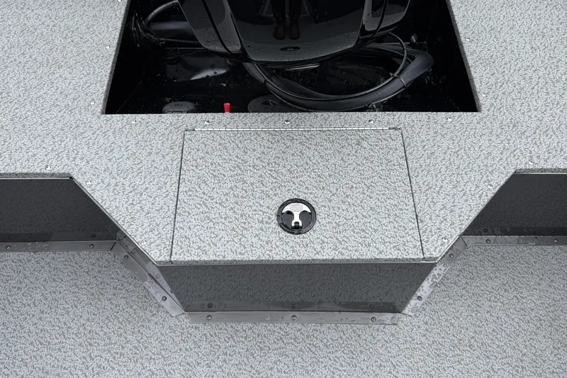 Slide: The Image of 2026 Smoker Craft Osprey 172 boat deck with storage compartment and motor. - 22