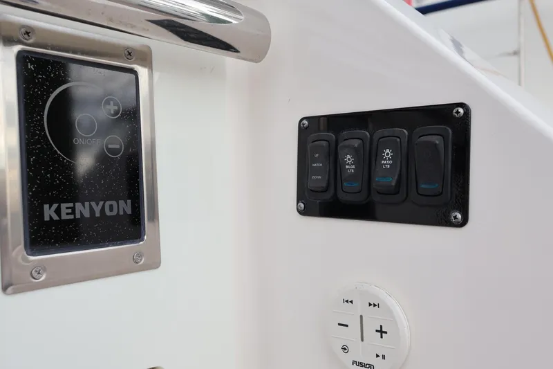 Slide: The Image of Control panel on 2022 Regal 36 XO boat with Kenyon and Fusion interfaces. - 19