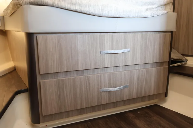 Slide: The Image of 2022 Regal 36 XO interior with wooden drawers and modern handles. - 44