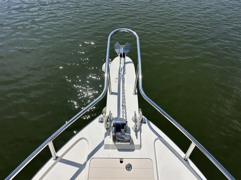 Slide: The Image of Bow of 2008 Parker 2310 Walkaround boat with anchor over calm water. - 8