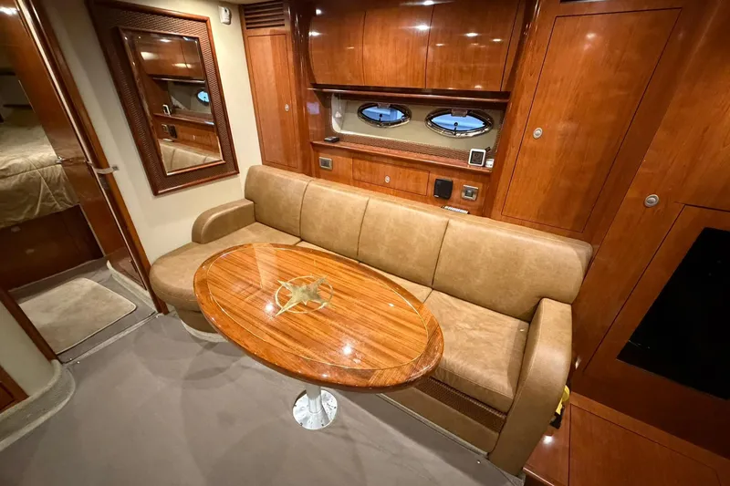 Slide: The Image of Luxurious interior of 2005 Sea Ray 390 Sundancer yacht with elegant wood finishes. - 12