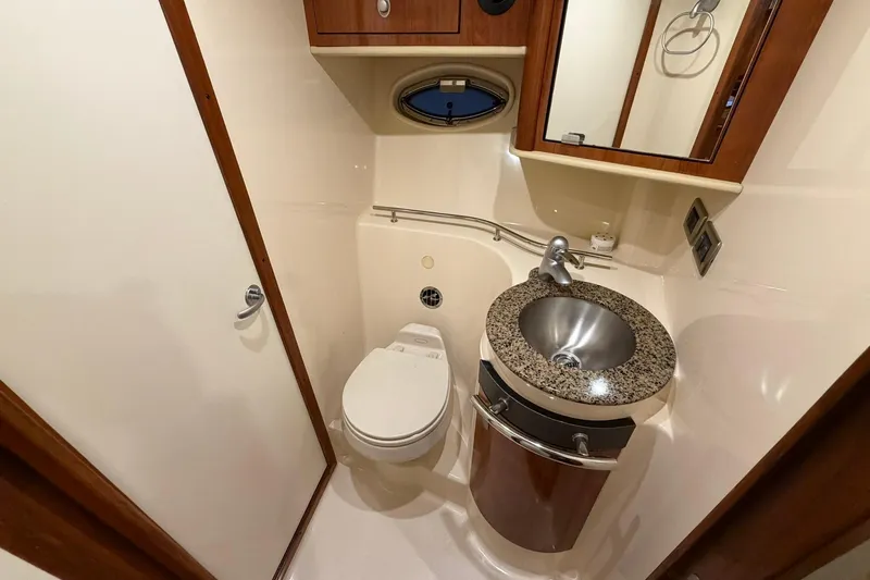 Slide: The Image of Luxurious bathroom in 2005 Sea Ray 390 Sundancer yacht with modern fixtures. - 18