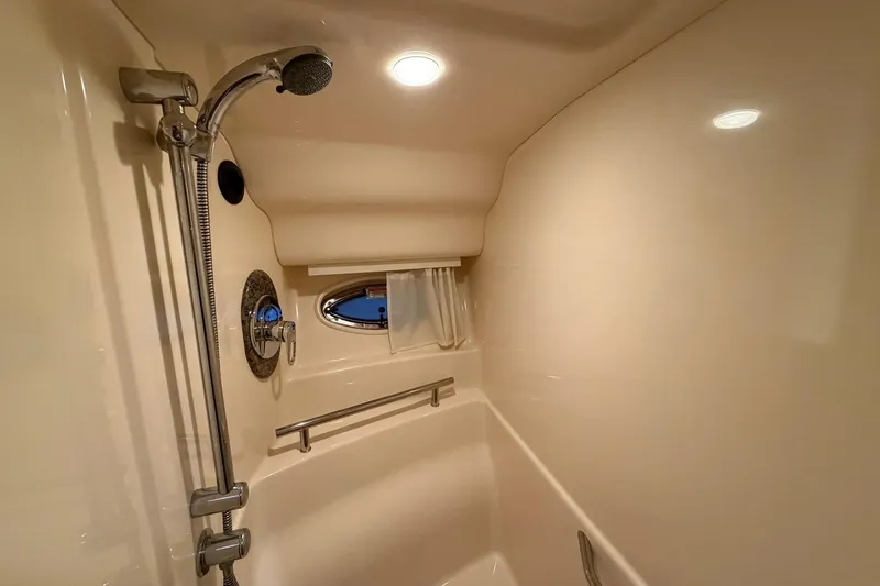 Slide: The Image of Luxurious shower area in 2005 Sea Ray 390 Sundancer yacht, featuring modern fixtures. - 19