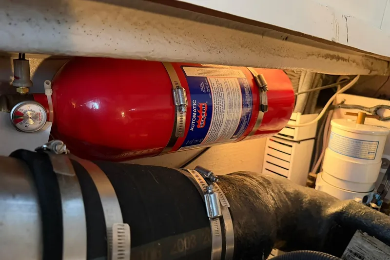 Slide: The Image of Engine room of 2005 Sea Ray 390 Sundancer with fire suppression system. - 29