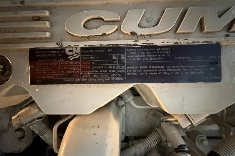 Slide: The Image of Engine label on a 2005 Sea Ray 390 Sundancer, displaying technical specifications. - 33