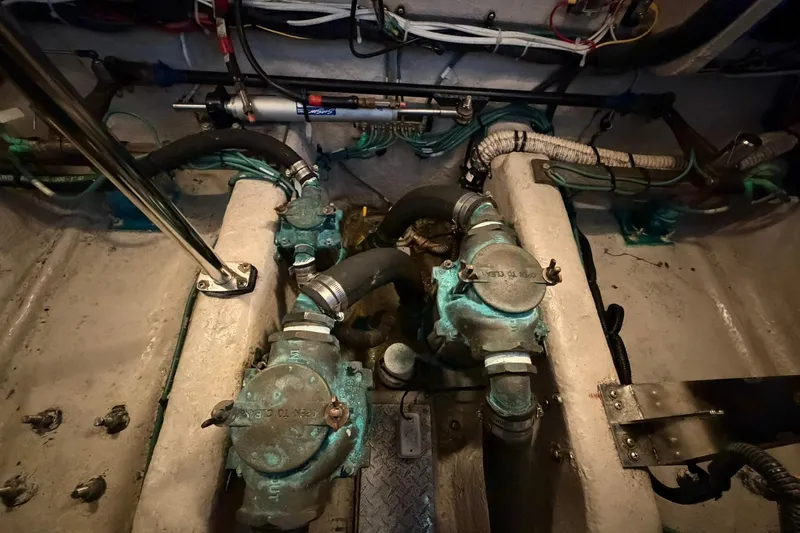 Slide: The Image of Engine room of 2005 Sea Ray 390 Sundancer with visible mechanical components. - 37