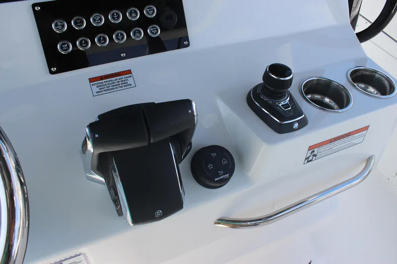 Slide: The Image of Control panel of 2023 Crevalle 33 CSF boat with joystick and throttle. - 16