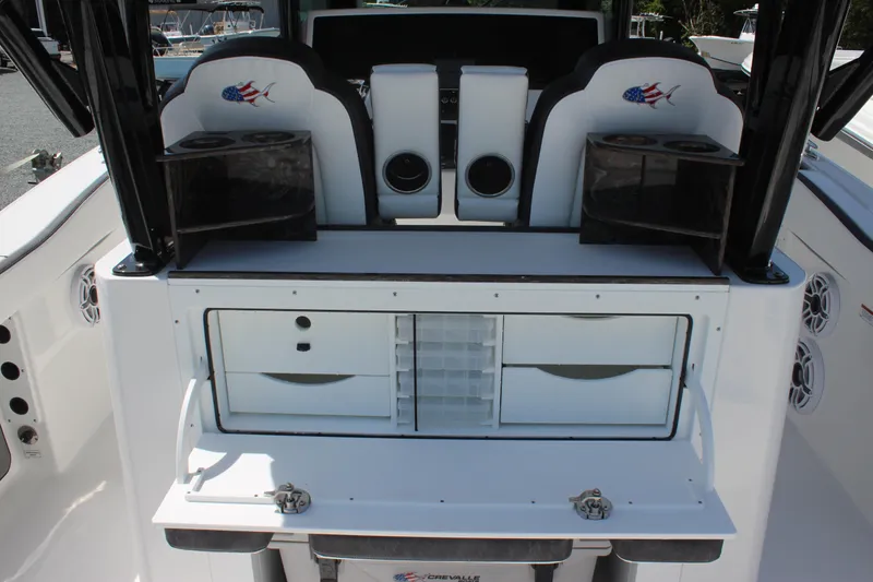 Slide: The Image of 2023 Crevalle 33 CSF boat interior with seating and storage compartments. - 24
