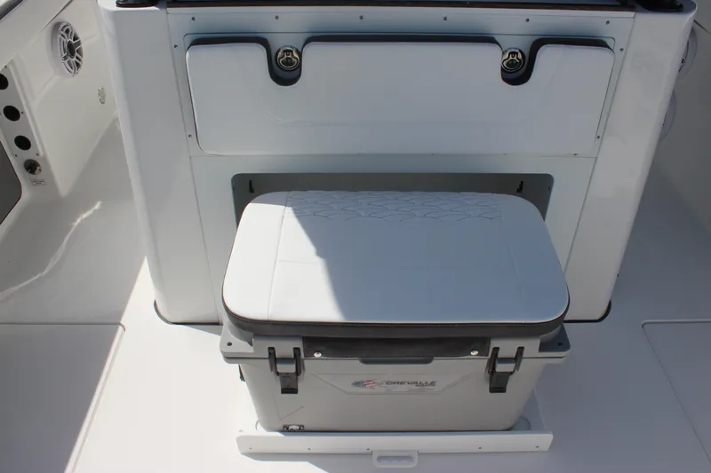 Slide: The Image of 2023 Crevalle 33 CSF boat interior with cushioned cooler seat. - 25