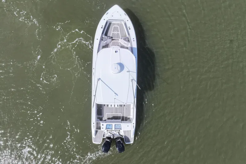 Slide: The Image of Aerial view of 2023 Crevalle 33 CSF boat on water. - 8
