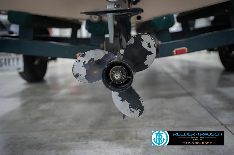 Slide: The Image of Propeller of 1999 Lund 1650 Explorer SS boat on trailer in garage. - 36