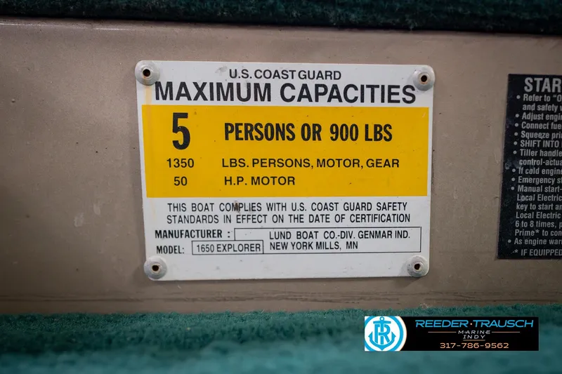Slide: The Image of 1999 Lund 1650 Explorer SS capacity plate, 5 persons or 900 lbs, U.S. Coast Guard compliant. - 47