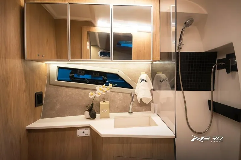 Slide: The Image of Luxurious bathroom interior of 2026 NX Boats NX370, featuring modern fixtures and elegant design. - 7