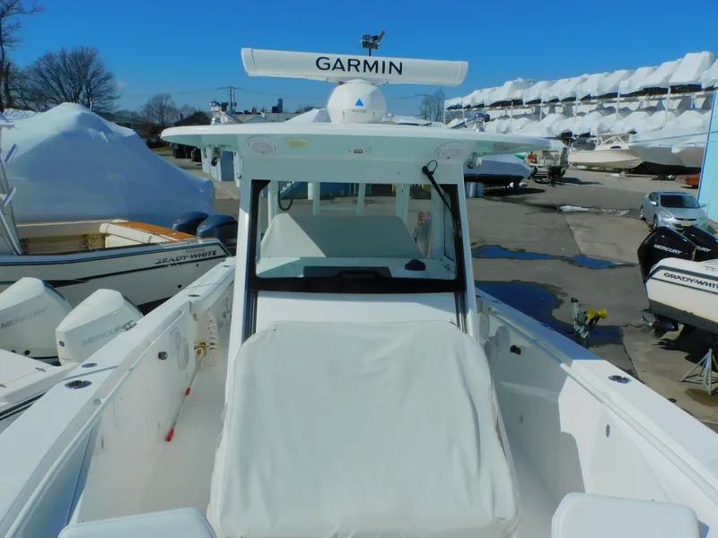 Slide: The Image of Underside of a 2019 Everglades 335 Center Console boat on a trailer. - 7