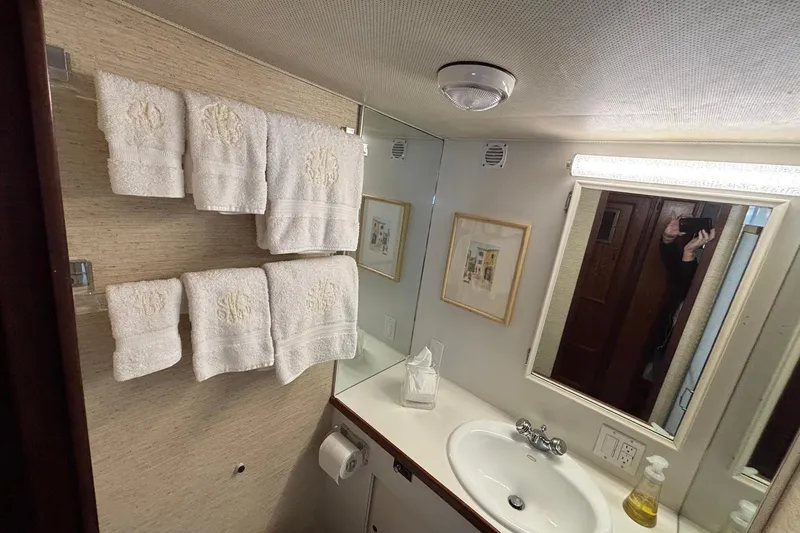 Slide: The Image of Bathroom interior of 1979 Hatteras 53 Motor Yacht with towels and sink. - 25