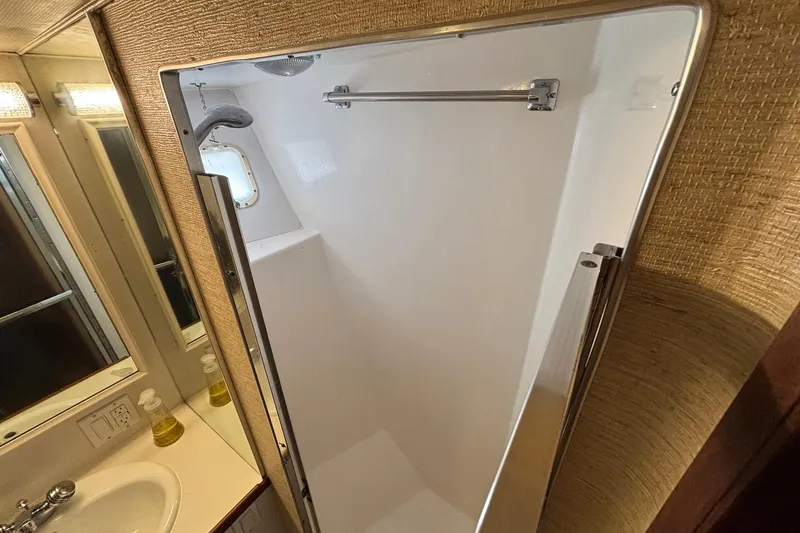Slide: The Image of Bathroom interior of 1979 Hatteras 53 Motor Yacht with shower and sink. - 28