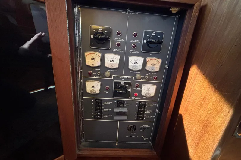 Slide: The Image of Electrical control panel on a 1979 Hatteras 53 Motor Yacht. - 56