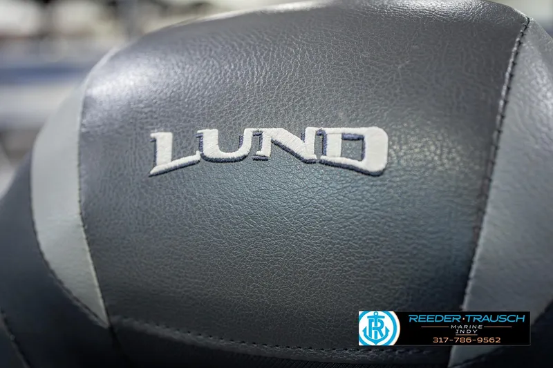 Slide: The Image of Close-up of 2022 Lund 1875 Impact boat seat with logo and dealership contact. - 41