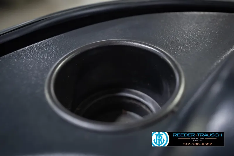 Slide: The Image of Cup holder in 2022 Lund 1875 Impact boat interior, featuring Reeder Trausch Marine logo. - 45