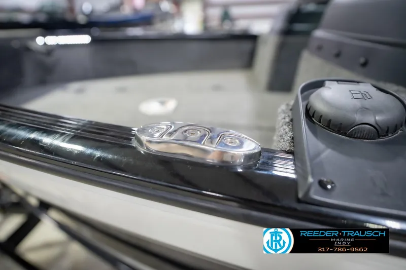 Slide: The Image of 2022 Lund 1875 Impact boat detail with Reeder-Trausch Marine branding. - 62