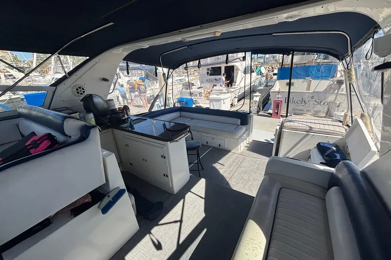 Slide: The Image of Interior of 1987 Californian 44 Veneti yacht with seating and helm station. - 4