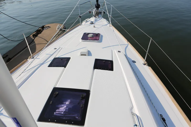 Slide: The Image of 2014 Beneteau Oceanis 41 sailboat deck, featuring sleek design and modern fittings. - 6