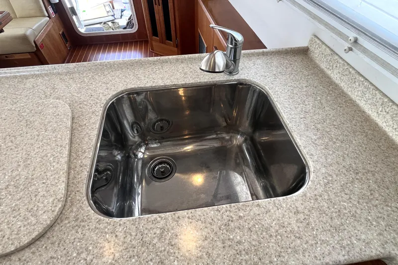 Slide: The Image of Stainless steel sink in 2008 Nordic Tug 42 yacht kitchen. - 28