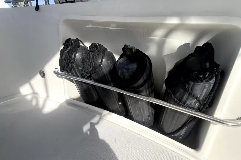 Slide: The Image of Black boat fenders stored on a 2008 Nordic Tug 42 yacht. - 51