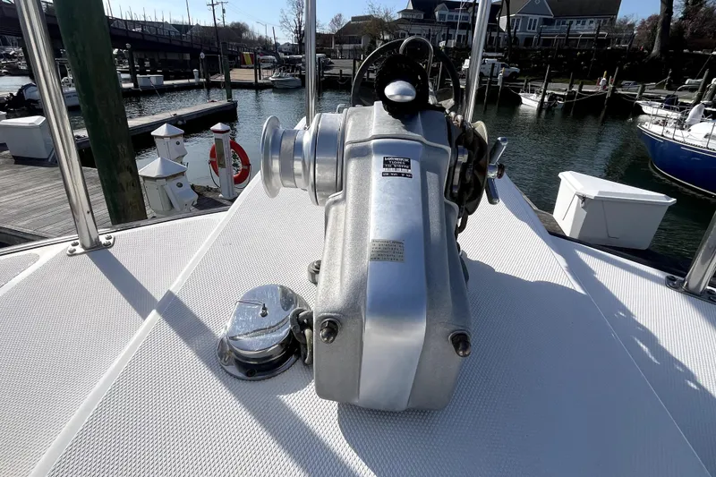 Slide: The Image of Nordic Tug 42 (2008) deck with anchor winch, docked at marina. - 68