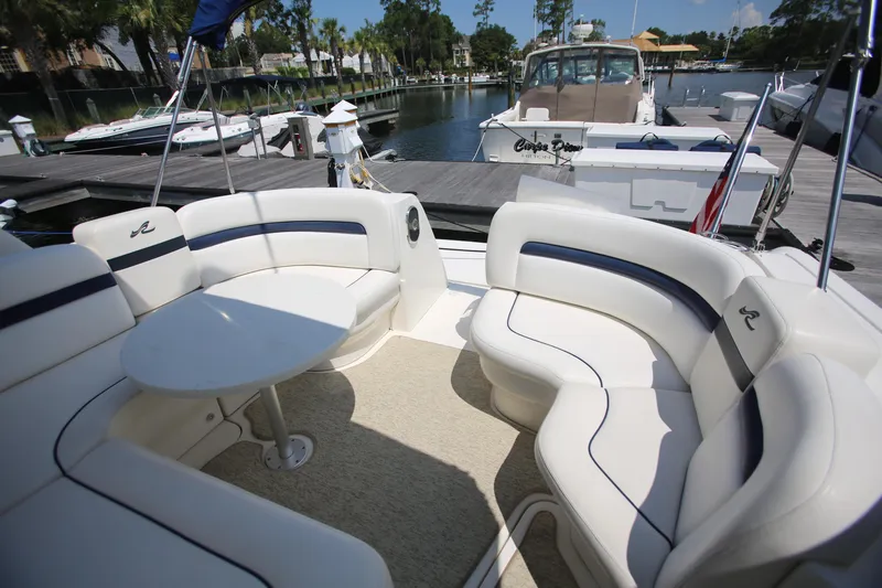 Slide: The Image of Luxurious seating area on a 2010 Sea Ray 390 Sundancer yacht at a marina. - 15