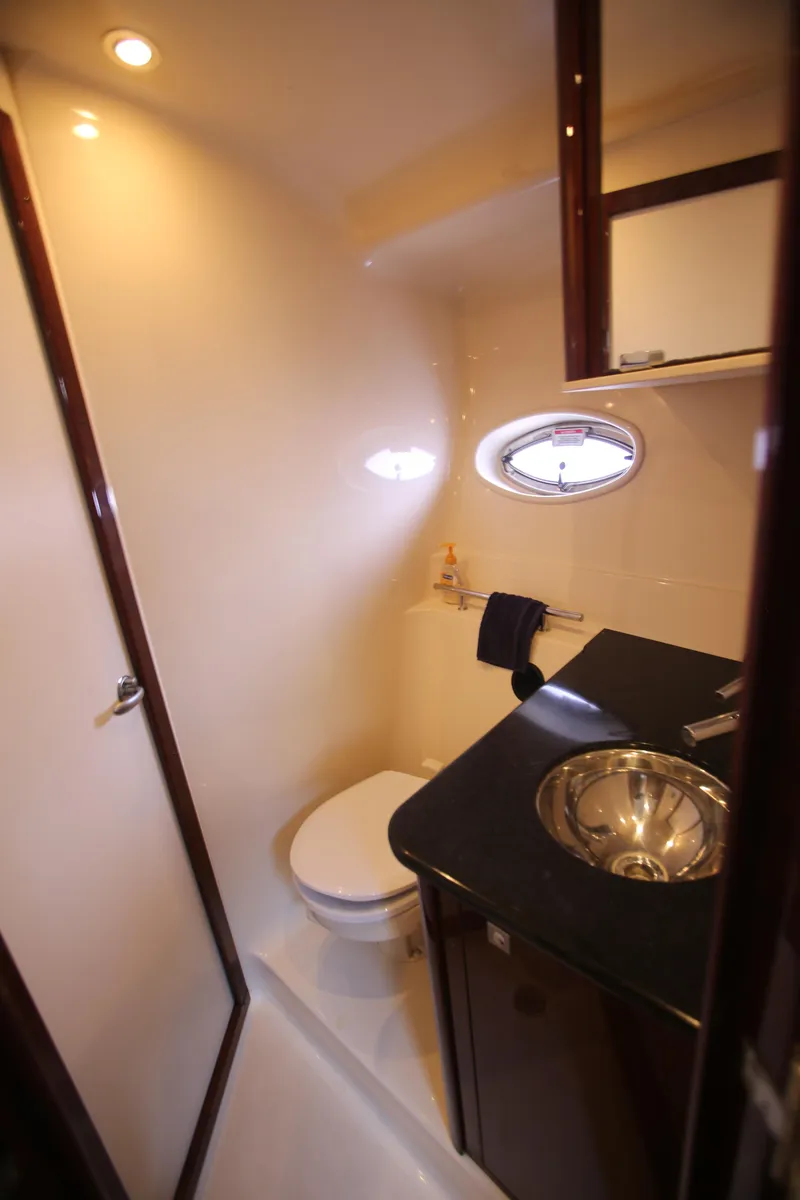 Slide: The Image of Luxurious bathroom in 2010 Sea Ray 390 Sundancer yacht with modern fixtures. - 29