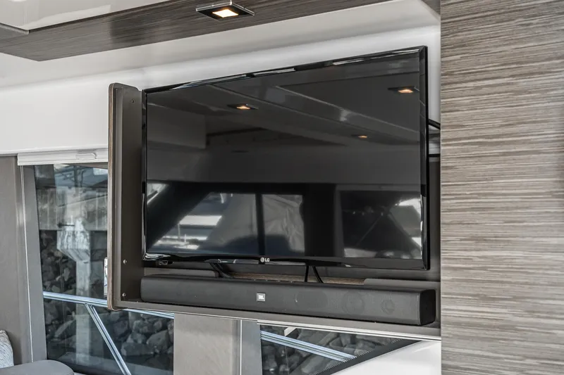 Slide: The Image of Interior of 2020 Tiara Yachts C39 Coupe with flat-screen TV. - 11