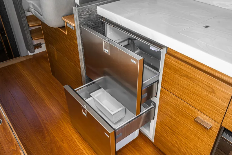 Slide: The Image of Interior of 2020 Tiara Yachts C39 Coupe with modern drawers. - 14