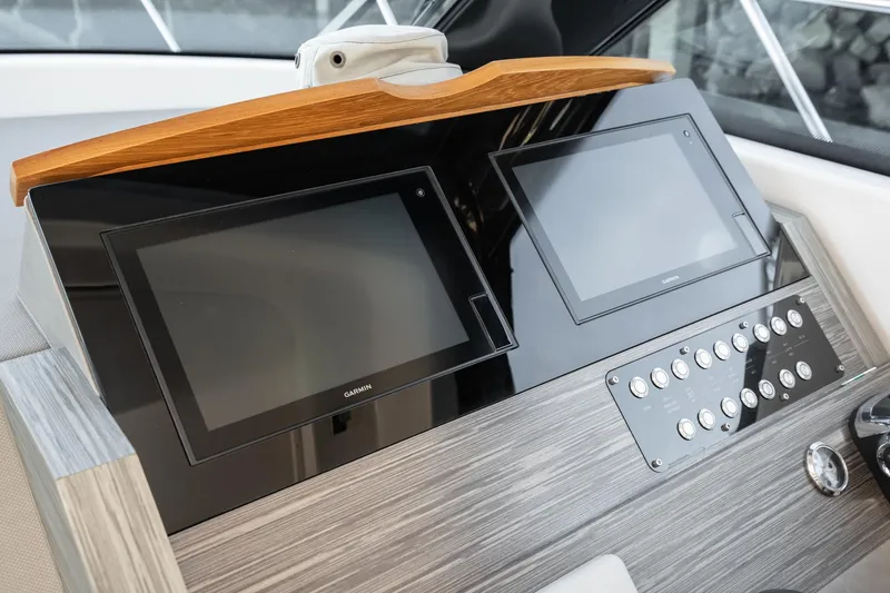 Slide: The Image of Dashboard of 2020 Tiara Yachts C39 Coupe with modern displays. - 22