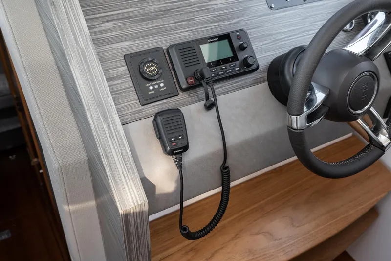 Slide: The Image of Tiara Yachts C39 Coupe 2020 helm with radio equipment. - 24