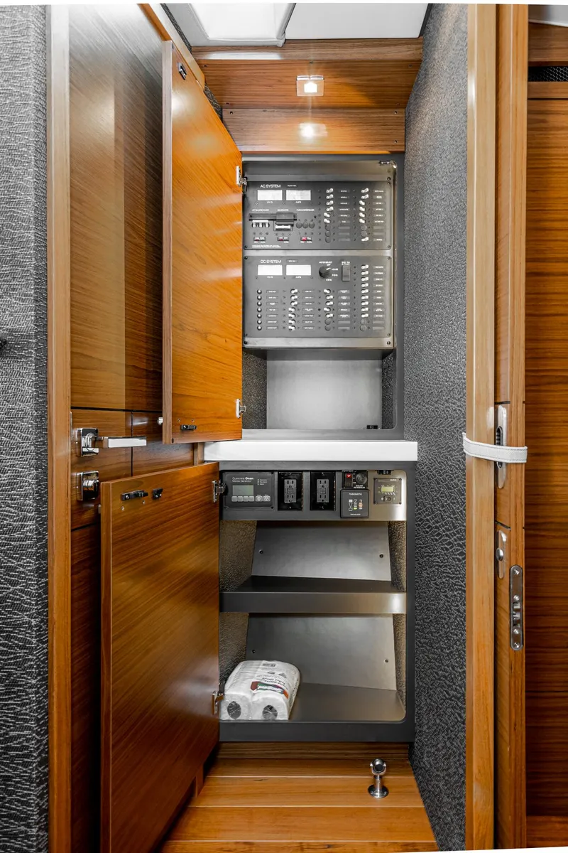 Slide: The Image of Interior of 2020 Tiara Yachts C39 Coupe with wood paneling. - 26