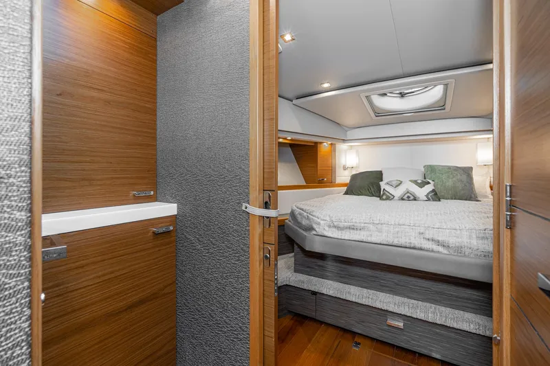Slide: The Image of Interior of 2020 Tiara Yachts C39 Coupe with cozy bedroom. - 28