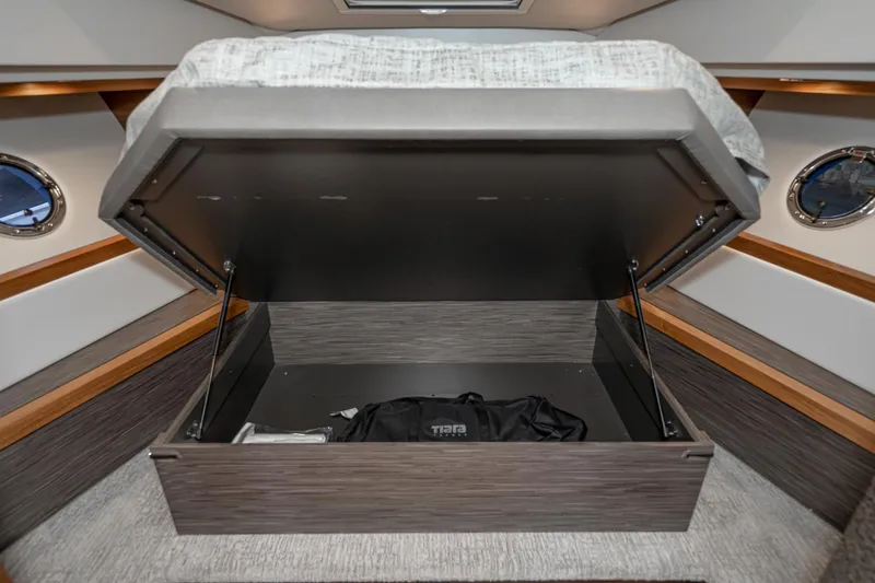Slide: The Image of Interior of 2020 Tiara Yachts C39 Coupe with under-bed storage. - 30