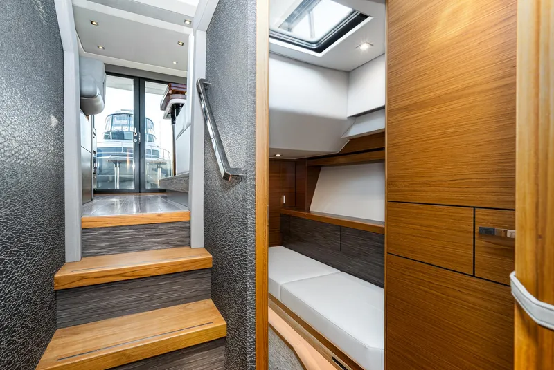 Slide: The Image of Interior of 2020 Tiara Yachts C39 Coupe with stairs and cabin. - 36